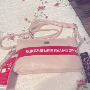 Small leather wristlet with shoulder strap